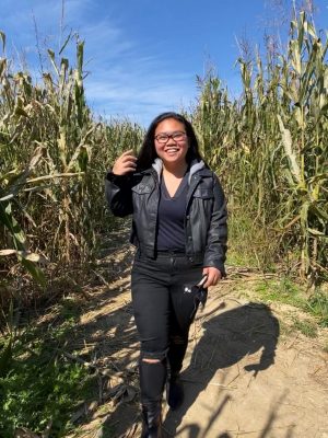 Joy Mendoza is out standing in her field