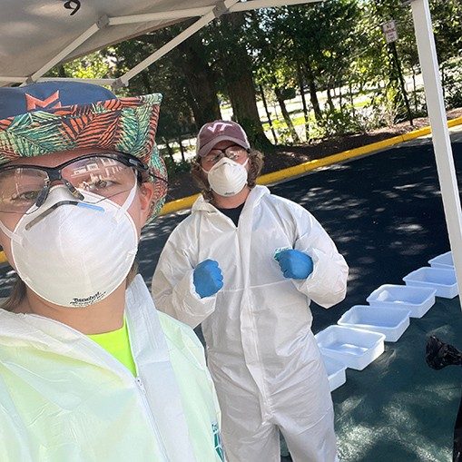 Kayla (at left) was digging thru waste produced at a retirement community for her undergrad research project. The research conducted a waste, energy, and carbon emission analysis for the company that operates the community.