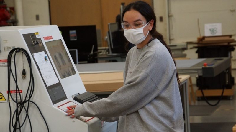 WEI student Marina Mecinski operates the Departments CNC router 
