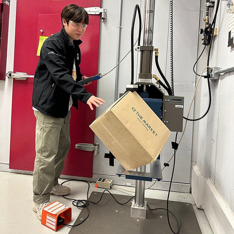 Saewhan Kim testing a package in the Center for Packaging and Unit Load Design