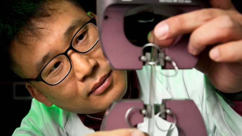 A professor uses a stress machine